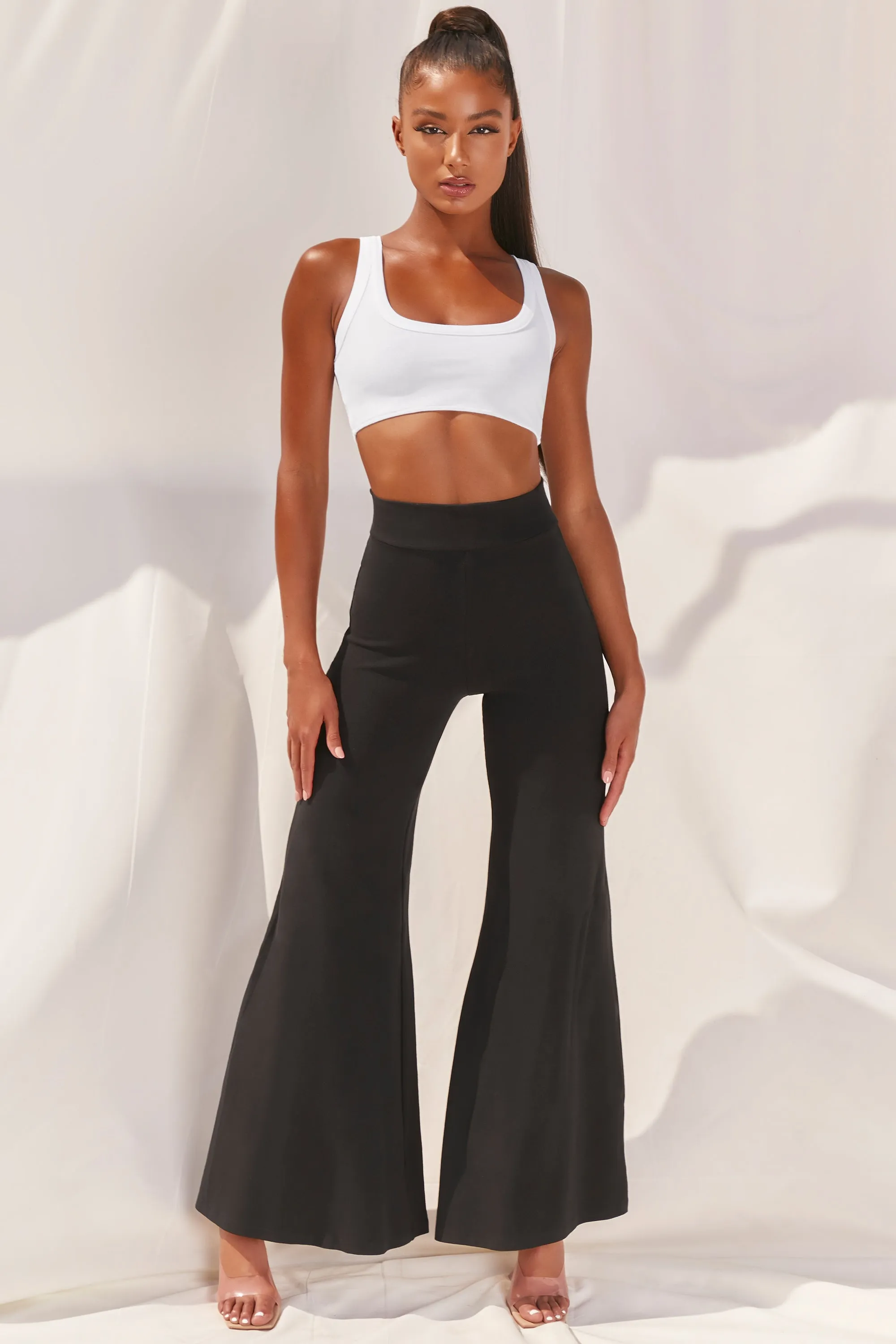 Cutting A Fine Figure Flared Trousers in Black